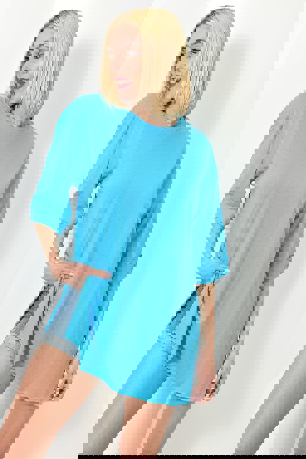 Μπλούζα μονόχρωμη με ανοίγματα Γαλάζιο 23560 φωτογραφία