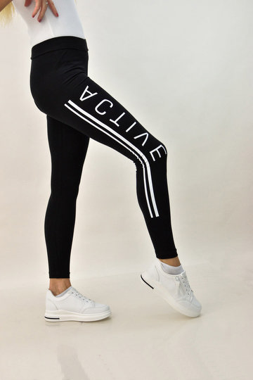 ελαστικό κολάν με στάμπα στο πλάι 'active' σε Μαύρο