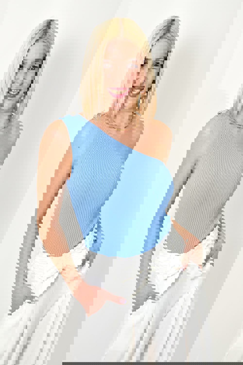 Γυναικείο τοπ με έναν ώμο και κουμπιά Γαλάζιο 23429 φωτογραφία